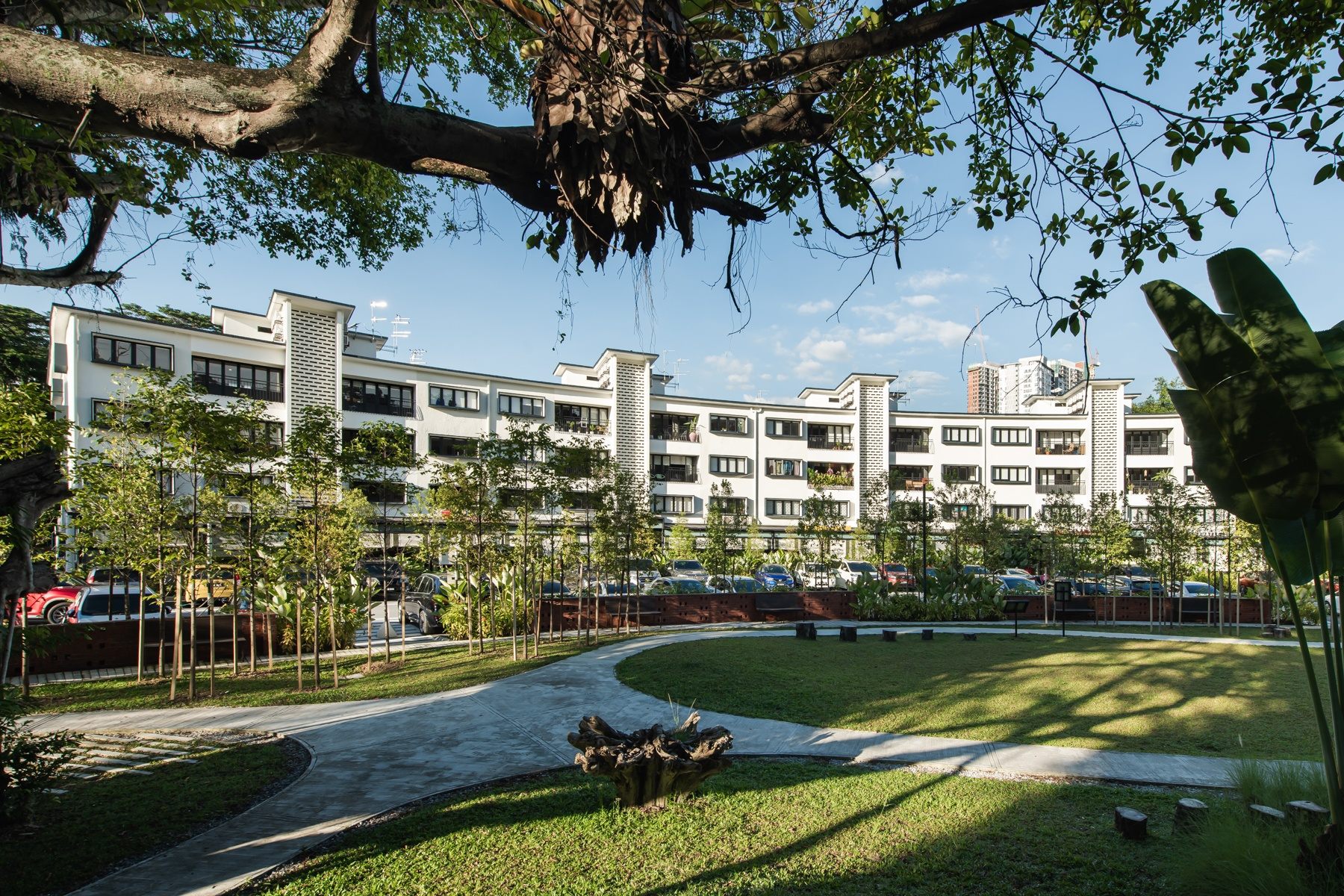 The Stories of Taman Tunku seen among the surrounding greenery