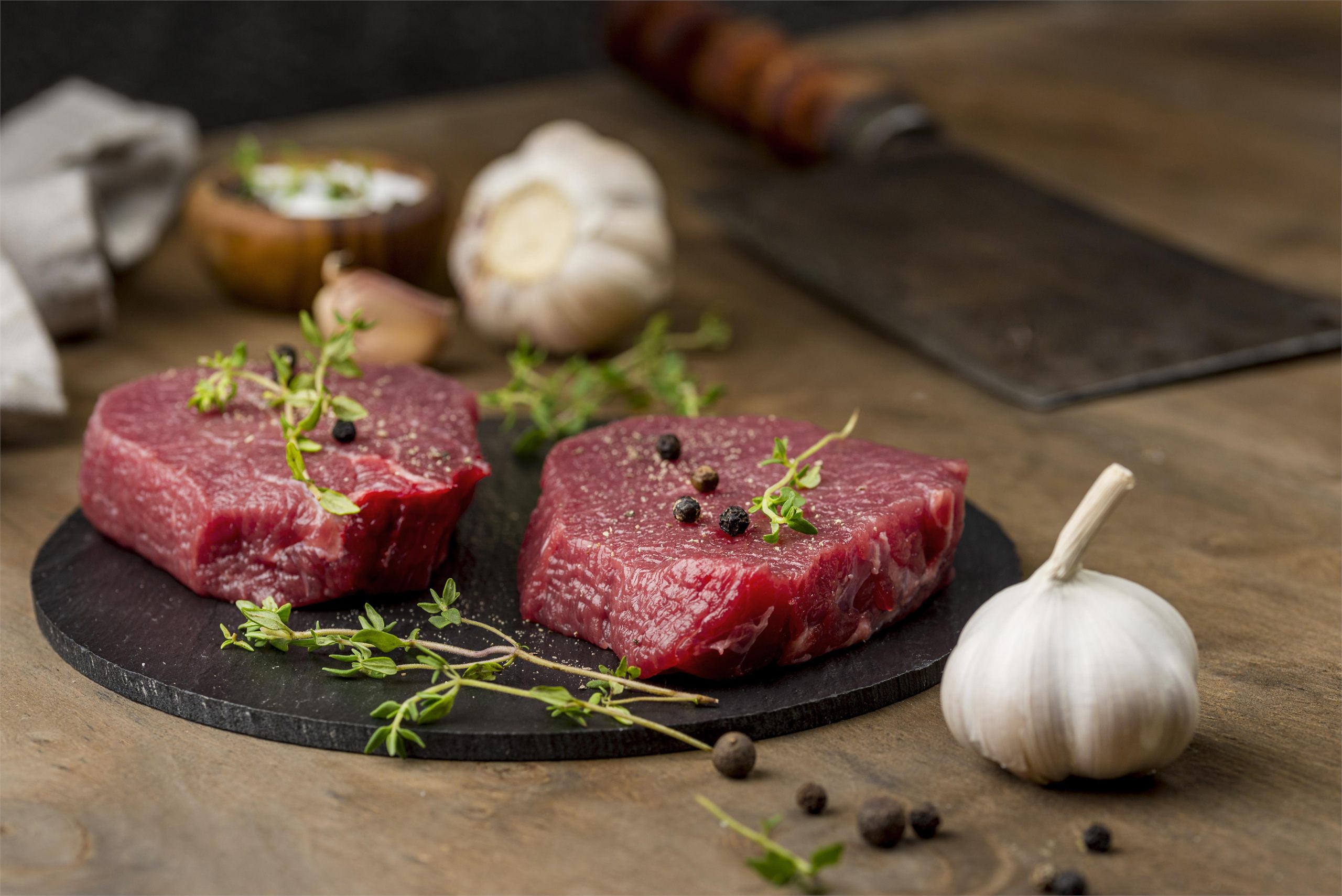 Cuts of beef with garlic and rosemary at Cork & Cleaver