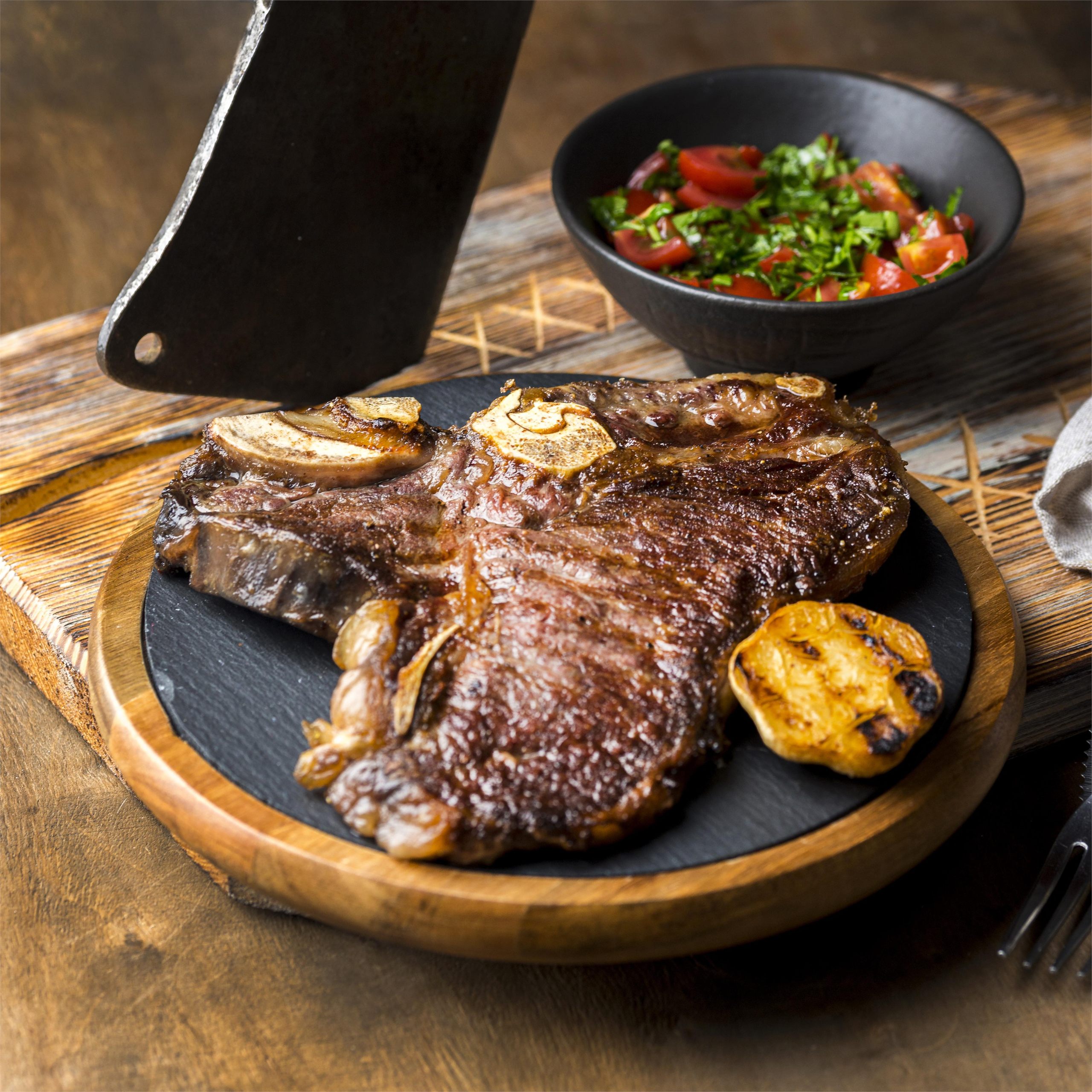 Steak cooked in a cast iron pan at Cork & Cleaver
