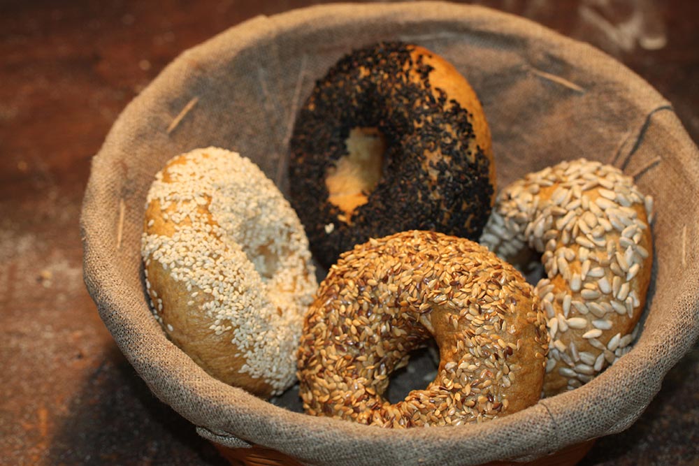 Basket of freshly baked bagels at Kenny Hills Bakers & Bistro
