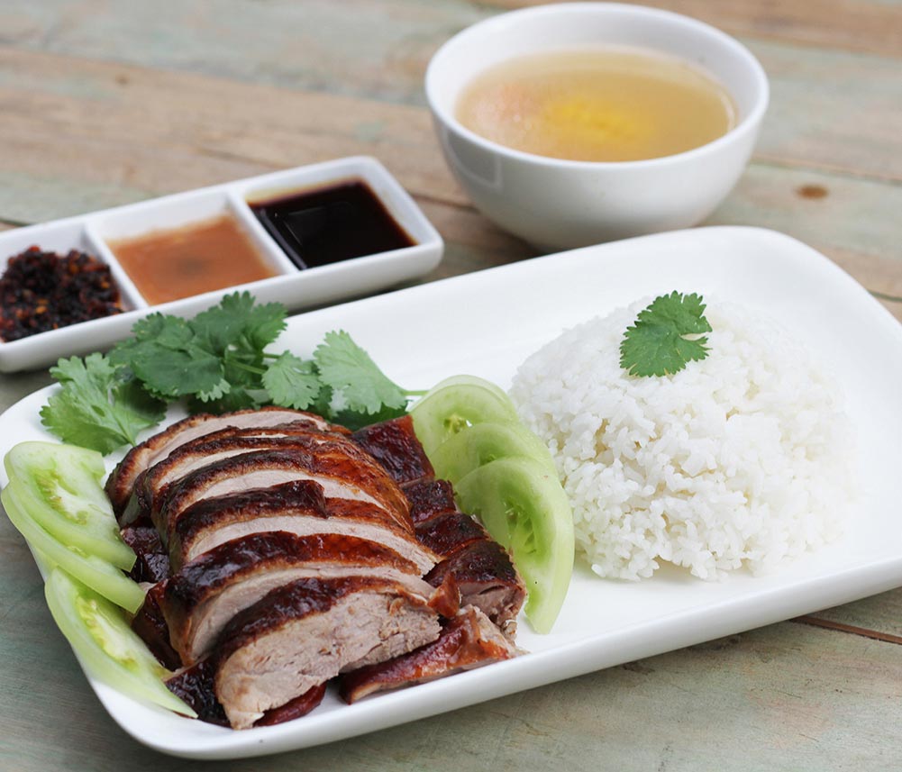 Sliced roast duck with rice at Kenny Hills Bakers & Bistro
