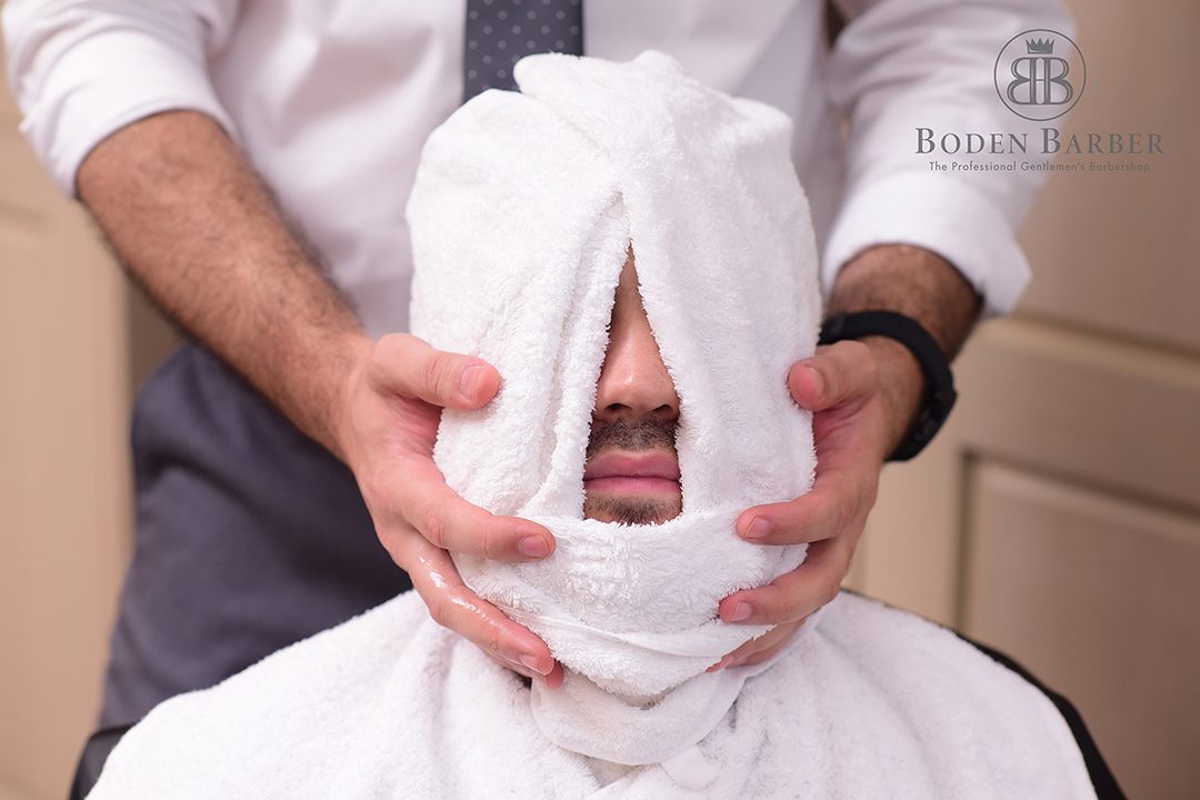 Grooming product being applied at Boden Barber